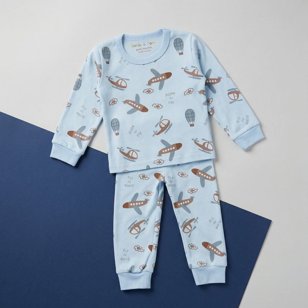 Children's pajama set with airplane pattern on a blue and gray background